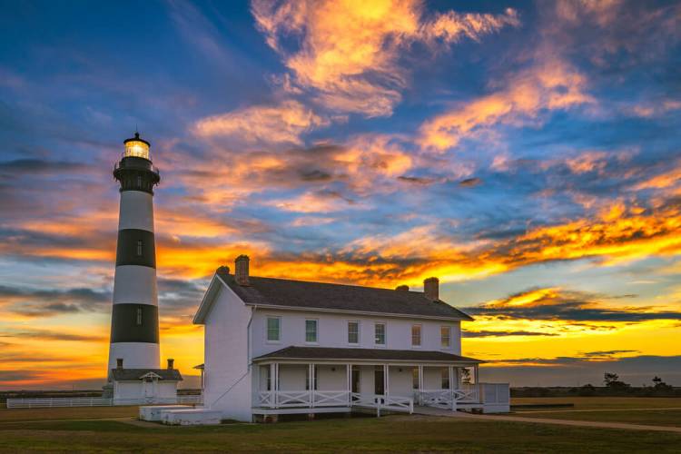 Black and white striped Lighthouse at sunset on Hatteras Island